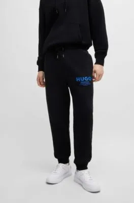 Cotton-terry tracksuit bottoms with logo print