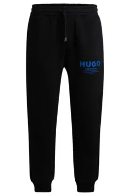 Cotton-terry tracksuit bottoms with logo print