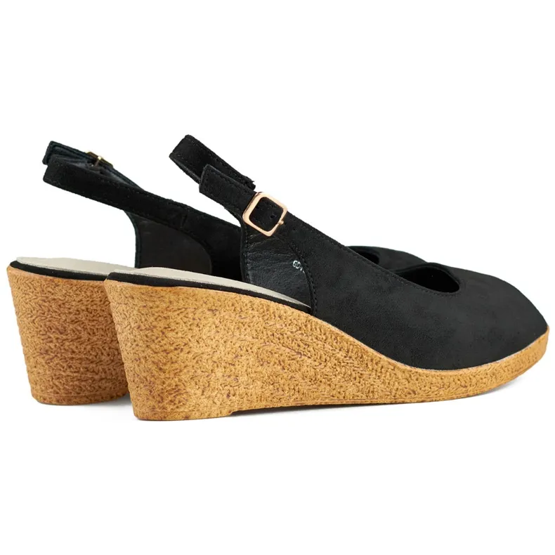 Ladies' black sandals on a low wedge