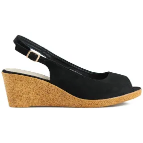 Ladies' black sandals on a low wedge